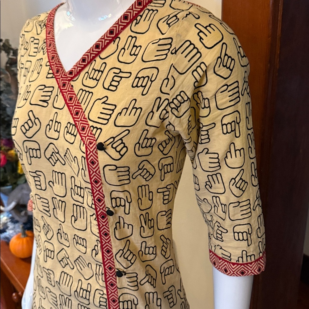 Purab & paschim size M Yellow Tunic with Hand Sign Pattern